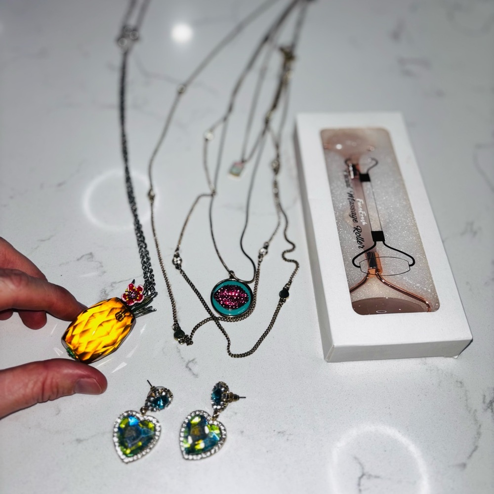 Bundle of two Betsy Johnson necklaces; Betsy Johnson Earrings and face roller!